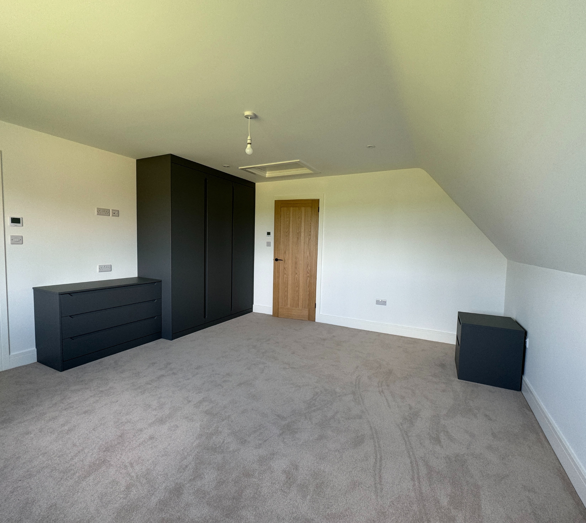 Empty bedroom with wardrobes